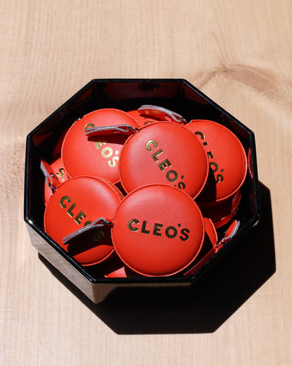 CLEO'S Red-Orange Tape Measure